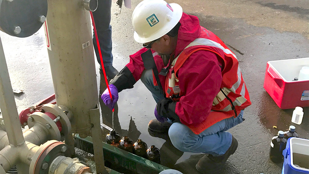 motive_marine_environmental2 Environmental Technicians collect water quality samples for lab testing from our water collection/pre-treatment system at Motive E-Port Shipyard